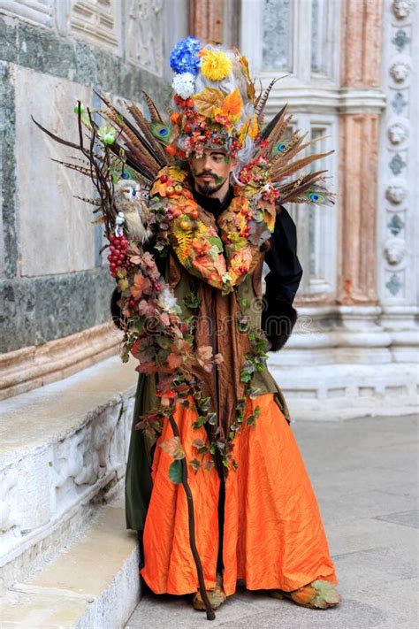 A Man In A Carnival Costume In San Marco Square Italy Venice Carnival