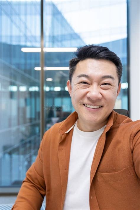 Asian Man Mature Businessman Taking A Selfie Video Call Using His Phone Stock Image Image Of