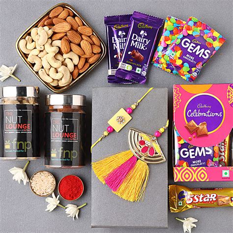 Buy Send Sneh Golden Bhaiya Bhabhi Rakhi With Sweet Treats Online FNP