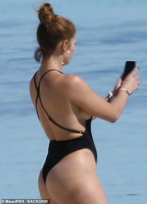 Jennifer Lopez Flaunts Her Famous Derriere In A Very Cheeky One Piece