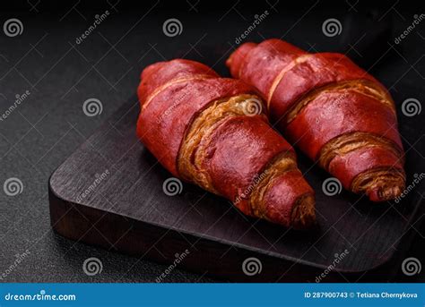 Delicious Sweet Crunchy Red Croissant With Cream Filling Stock Image