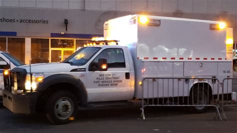 NYPD Fleet Services Division Roadside Repair Working On The Engine Of