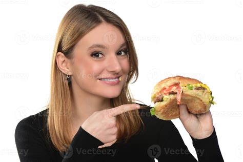 Portrait Of A Beautiful Funny Young Girl Eating Hamburger 15975487