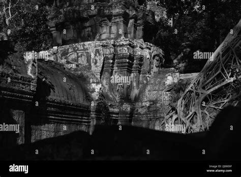 A Tower Decorated With Apsara Figure Located At A Corner Of Ta Prohm