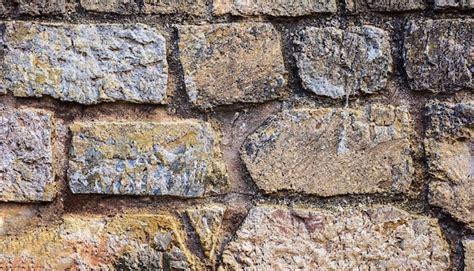 Premium Photo | Texture of a stone wall Old castle stone wall texture background Stone wall as a ...