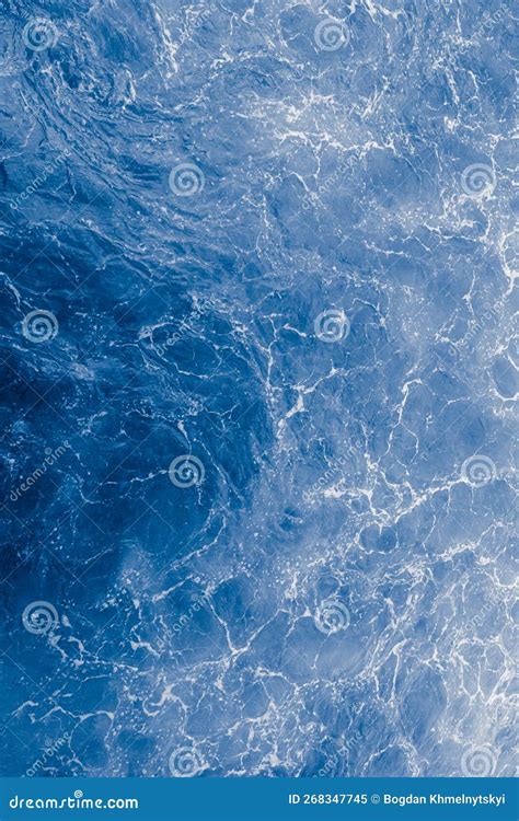 Blue Purple Sea Surface With Waves Splash And Bubbles Stock Image