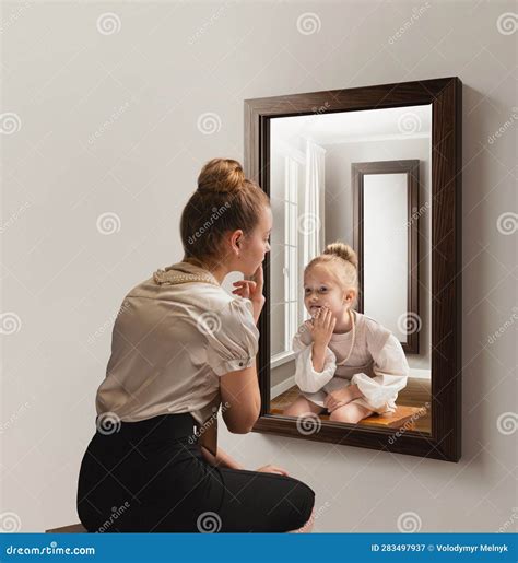 Creative Conceptual Collage. Young Woman Looking in Mirror and Seeing