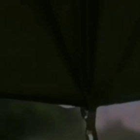 An Umbrella Is Shown In The Dark With Light Coming From It S Top And Bottom