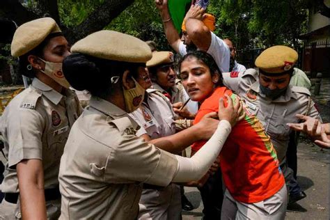 Protesting Wrestlers Vinesh Phogat Sakshi Malik And Bajrang Punia