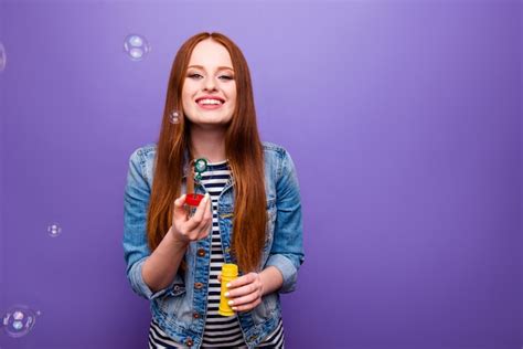 Premium Photo Lovely Redhead Woman Posing With Denim Jacket