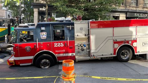 Montreal firetruck stuck in pothole | CTV News