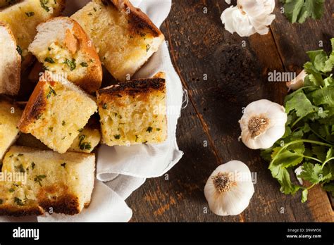 Homemade Crunchy Garlic Bread With Butter And Parsley Stock Photo Alamy