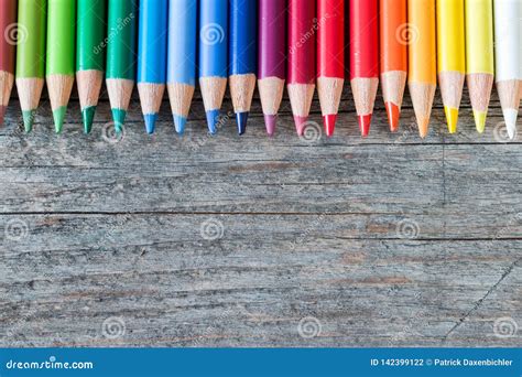 Creativity Multi Colored Pencils On Rustic Wooden Table Stock Photo