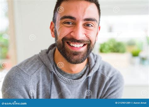 Handsome Man Smiling Cheerful With A Big Smile On Face Showing Teeth