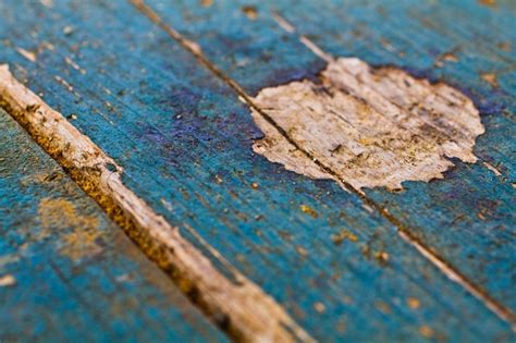 Premium Photo CloseUp Of Blue Weathered Wood With Peeling Paint