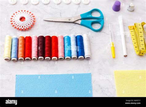 Colorful Sewing And Tailoring Tools And Items On Light Background Stock