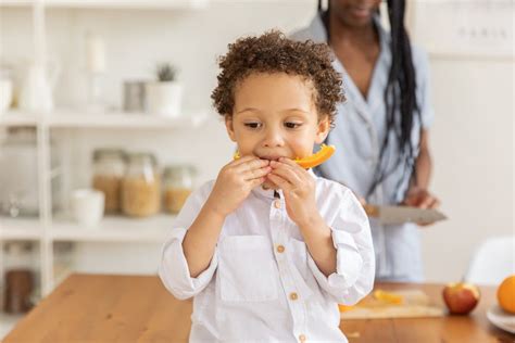 Boy Eating Fruit · Free Stock Photo