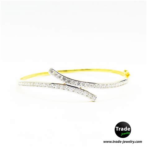 BR-0810 กำไลทองทรงไขว้ฝังเพชร 1.2CT น้ำ 97 สั่งซื้อได้ที่ Trade-Jewelry ...