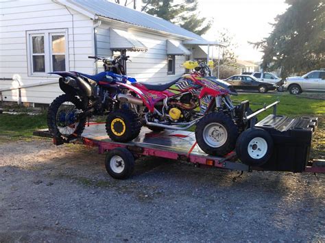 A Harbor Freight 4x8 Folding Trailer Will Hold 3 Full Size Dirt Bikes