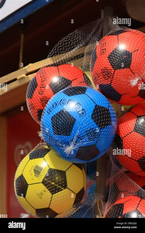 Plastic Soccer balls or Footballs for sale Stock Photo - Alamy