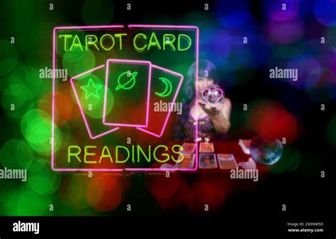 Tarot Card Readings Sign With Psychic Card Reader In Background Stock