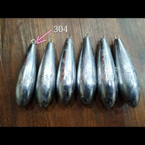 Batu Ladung Pancing Pantai G G Fishing Lead Sinker With Hook