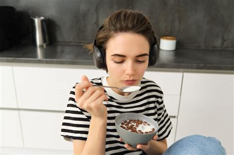 Premium Photo Image Of Stylish Modern Woman Student Eating Cereals