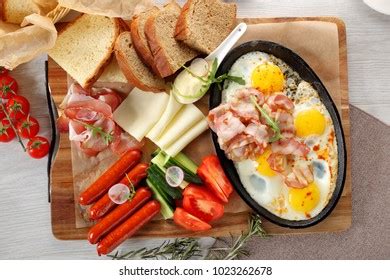 Close Rustic Full English Breakfast On Stock Photo