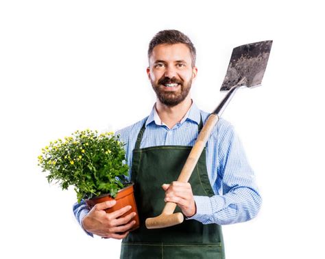 Jardineiro Considerável Posição Verde Das Calças E Do Chapéu De