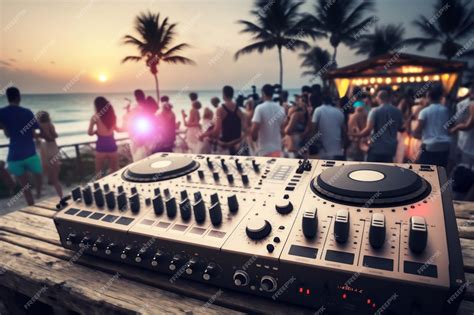 Premium AI Image | Professional DJ Console and Blurred Crowd at Night Beach Music Party music day AI