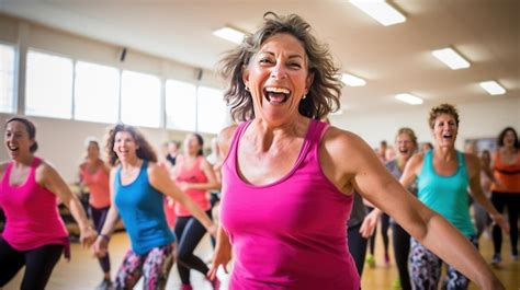 Premium Photo Group Of Middleaged Women Enjoying A Joyful Dance Class