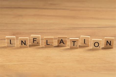 Premium Photo The Word Inflation On Wooden Cubes On A Wooden