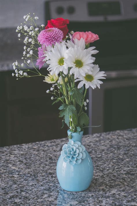 Assorted Flowers In Blue Vase · Free Stock Photo