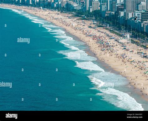 Aerial View Of Ipanema Beach And Leblon People Sunbathing And Playing