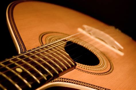 Os instrumentos do Fado A guitarra Portuguesa e Clássica O fado