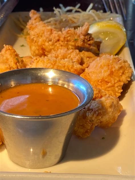 Pappadeaux Fried Alligator Bites With Cajun Dip And A Side Of Potato