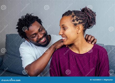 Black Boyfriend Giving Girlfriend Neck And Shoulders Massage Stock Image Image Of Living