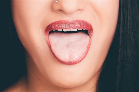 Woman With Wide Open Mouth And Tongue Out · Free Stock Photo