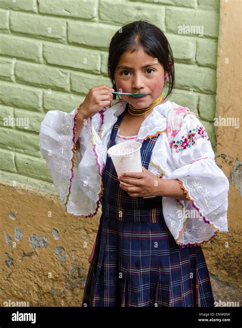 Girl Wearing Traditional Ecuadorian Costume At Otavalo Market Ecuardor