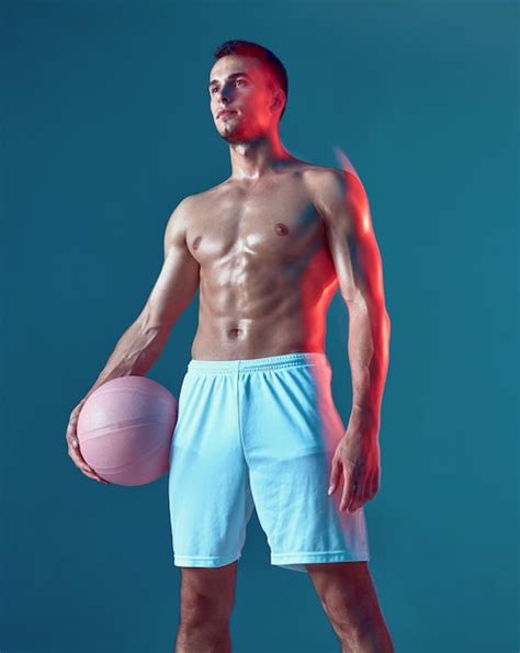 Premium Photo Male Basketball Player With Naked Muscular Torso