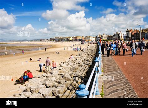 Morecambe Beach And Seafront Promenade Looking Toward The Clock Tower