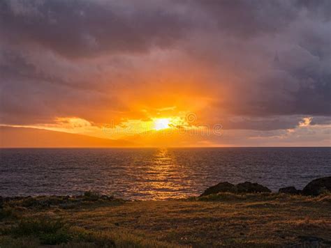 Dramatic Orange Sunset With Clouds On The Beach Stock Photo Image Of