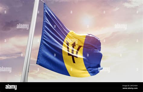 Barbados Waving Flag In Beautiful Sky Stock Photo Alamy