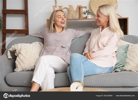 Happy Young Beautiful Woman Her Mother Sitting Sofa Living Room Stock