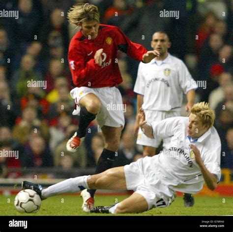 Manchester United S David Beckham Challenges Alan Smith Of Leeds United