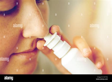 Close Up Of Sick Woman Using Nasal Spray Stock Photo Alamy