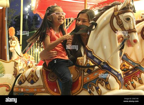 Divorced Single Mom And Year Old Brunette Latina Daughter Spend Fun Time On Amusement Park