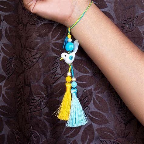 Send Evil Eye Colorful Bhaiya Bhabhi Rakhi Online Rakhibazaar