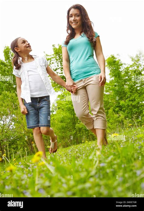 A Mothers Treasure Is Her Daughter A Mother And Daughter Holding Hands