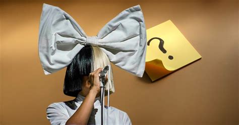 Why Does Sia Cover Or Hide Her Face?